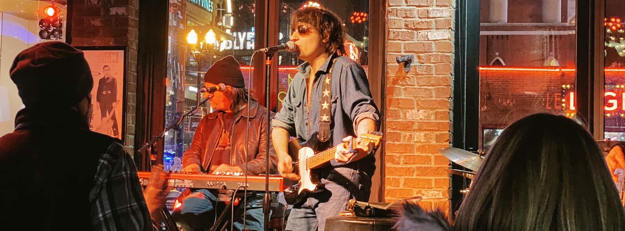 bar singer on guitar in Winston-Salem